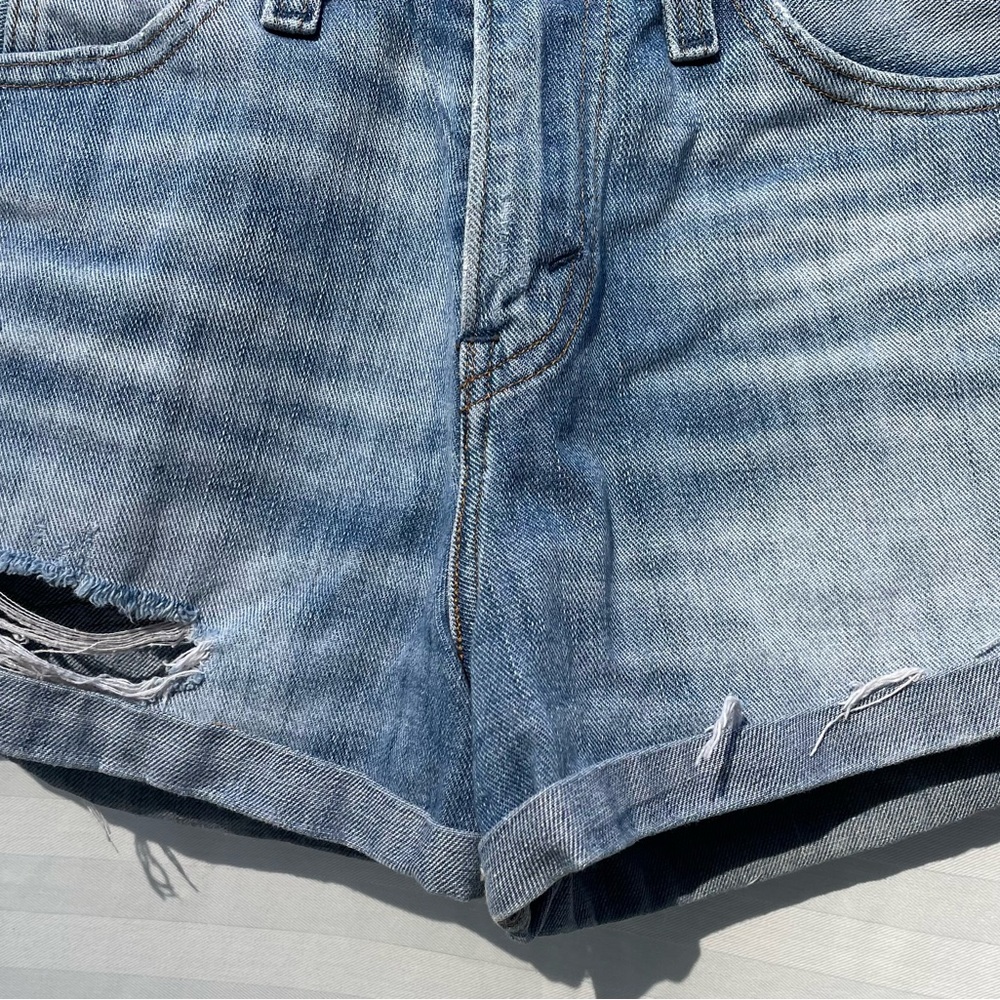 Distressed light blue Levi’s juniors size 25 soft light weight Jean shorts